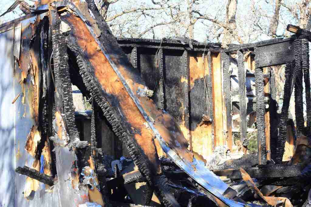 A burned wall leftover from a house fire