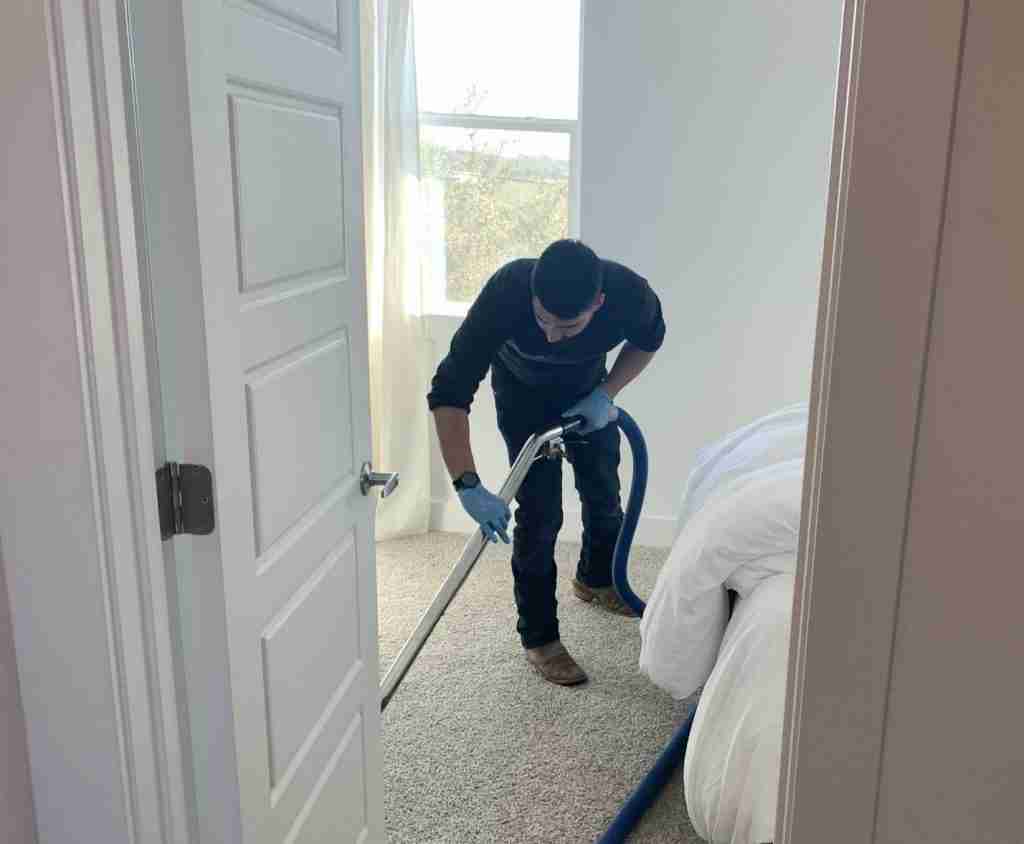 Chris Moreno extracting water with an extraction wand