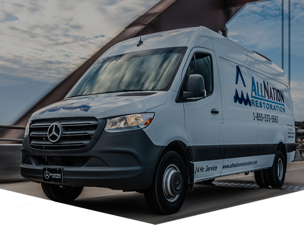 All Nation Restoration's service van driving over pennybacker bridge