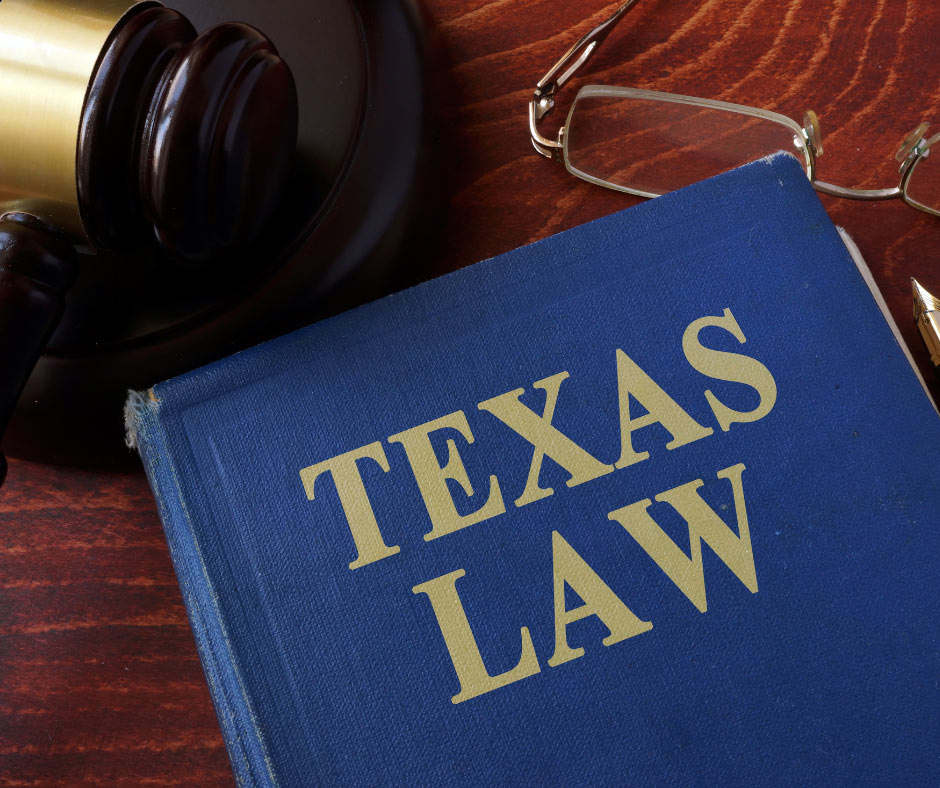 Texas law book with a gavel laying next to it