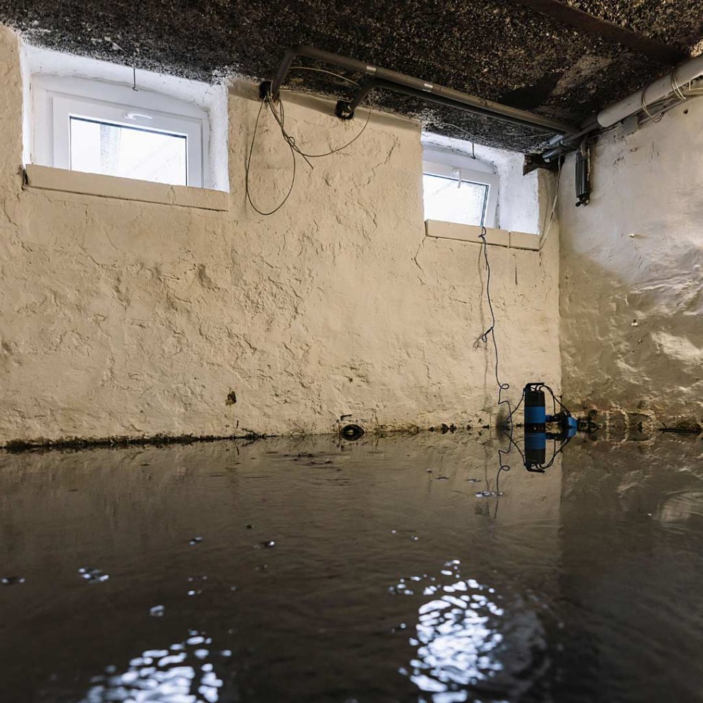 stagnant flood water in basement of home