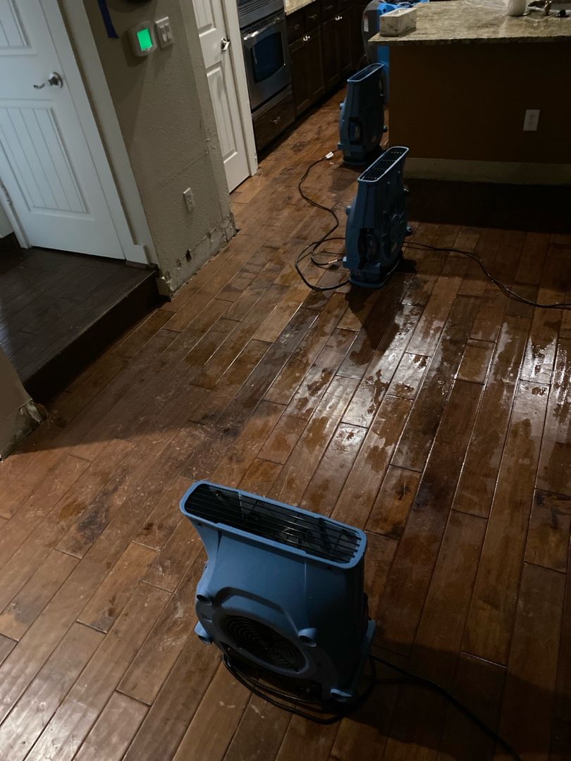 drying equipment in house with wet floor
