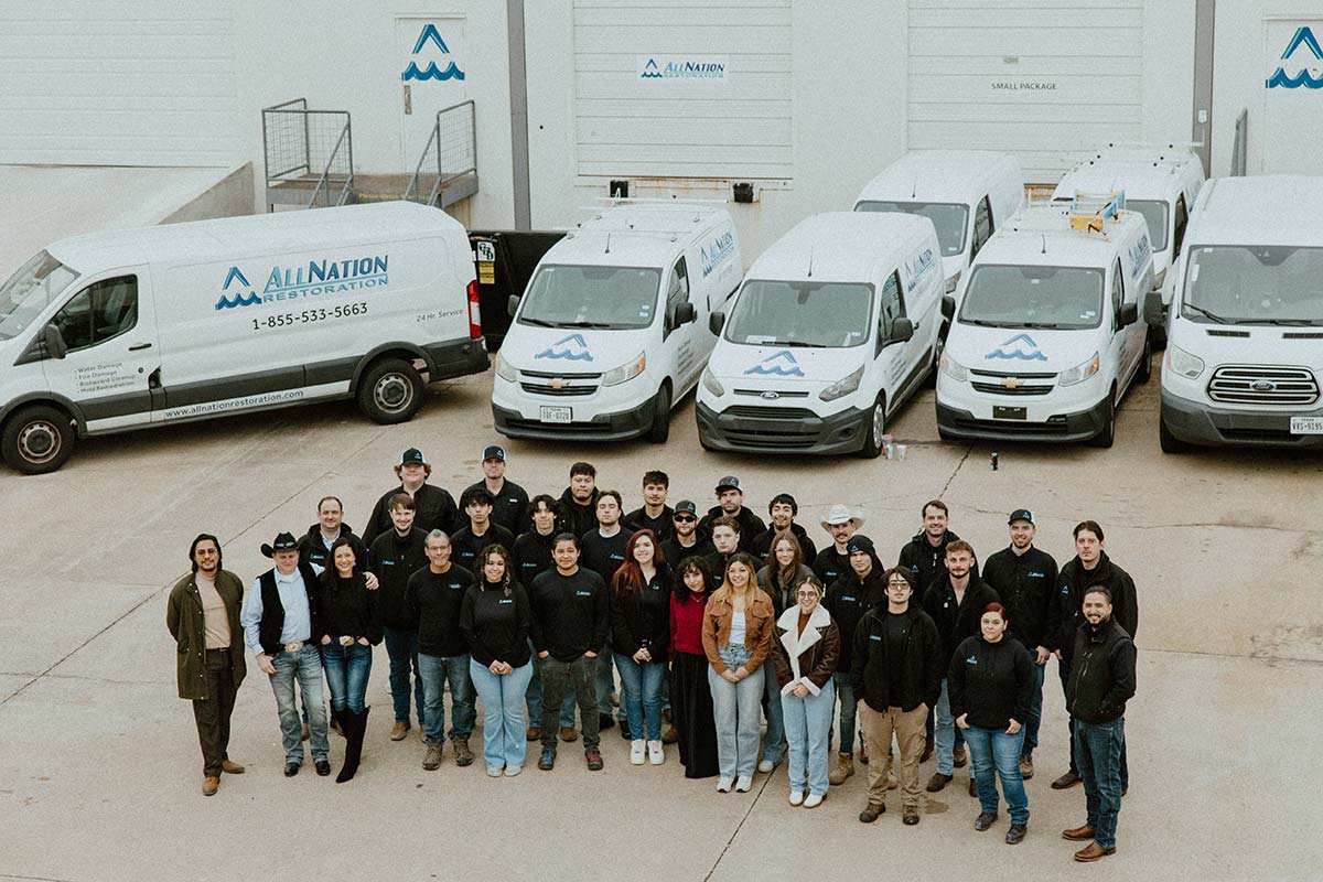 full team together with vans around